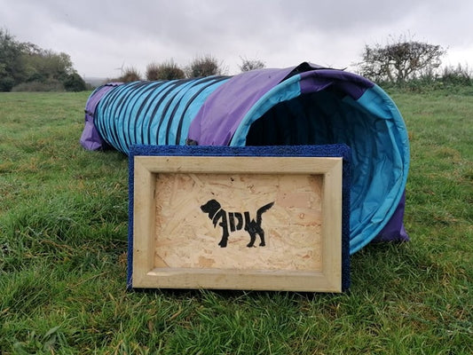 Photo: Placeboard on an agility tunnel