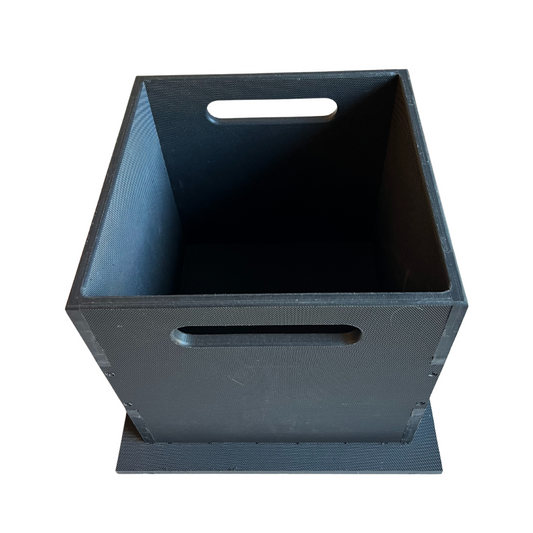A black recycled plastic feeding box for training dogs obedience, focus, tracking and protection sports